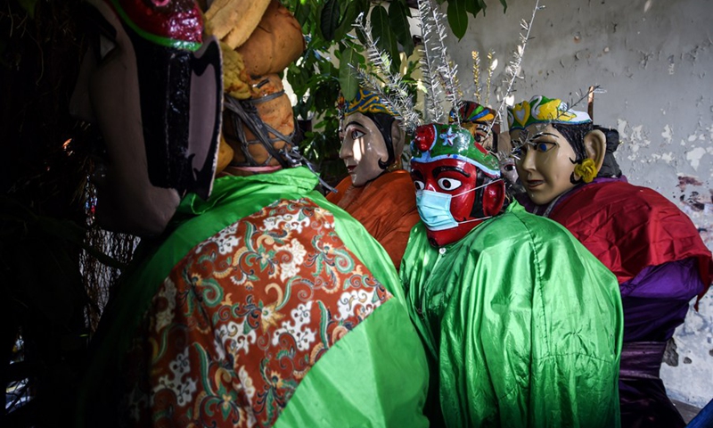 Traditional giants effigies namely Ondel-Ondel are displayed in Jakarta, Indonesia, June 7, 2021.(Photo: Xinhua)