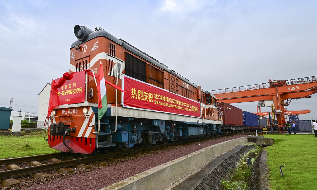 A cargo train loaded with spare parts, electronics and daily necessities departs from Jinhua, East China's Zhejiang Province, one of the country's major foreign trade engines, to Budapest in Hungary on Monday. The number of China-Europe freight trains hit 1,218 in April, up 24 percent year-on-year, data from the National Development and Reform Commission showed. Photo: cnsphoto
