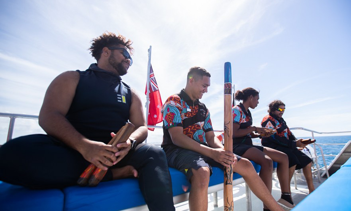 Photo taken on June 2, 2021 shows Brian Connolly (2nd L) aboriginal coral reef persevere volunteer cruising Great Barrier Reef in Queensland, Australia. (Photo by Hu Jingchen/Xinhua)
