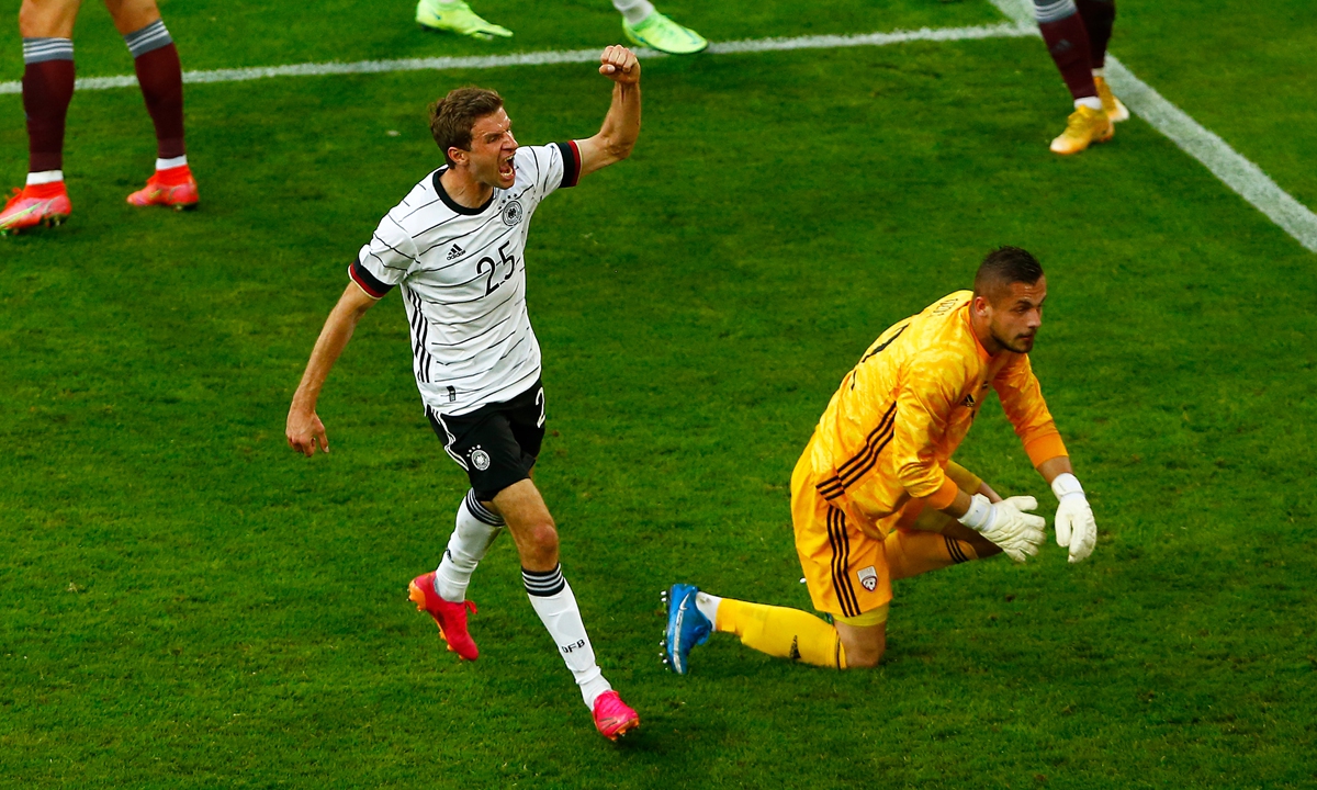 Thomas Mueller of Germany celebrates after scoring against Latvia on Monday in Duesseldorf, Germany. Photo: VCG