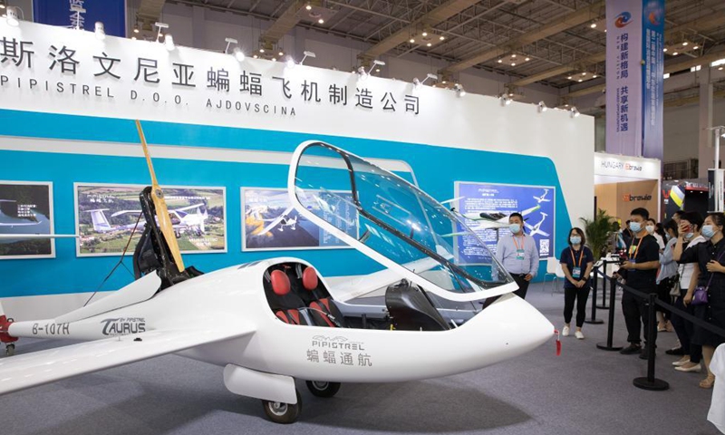 Visitors view a plane from Slovenia at the second China-Central and Eastern European Countries (CEEC) Expo in Ningbo, east China's Zhejiang Province, June 9, 2021. The expo opened to public visitors on Wednesday. Themed Fostering a New Development Paradigm, Sharing a Win-Win Opportunity, the expo aims to boost trade between China and Central and Eastern European Countries (CEECs). Photo: Xinhua