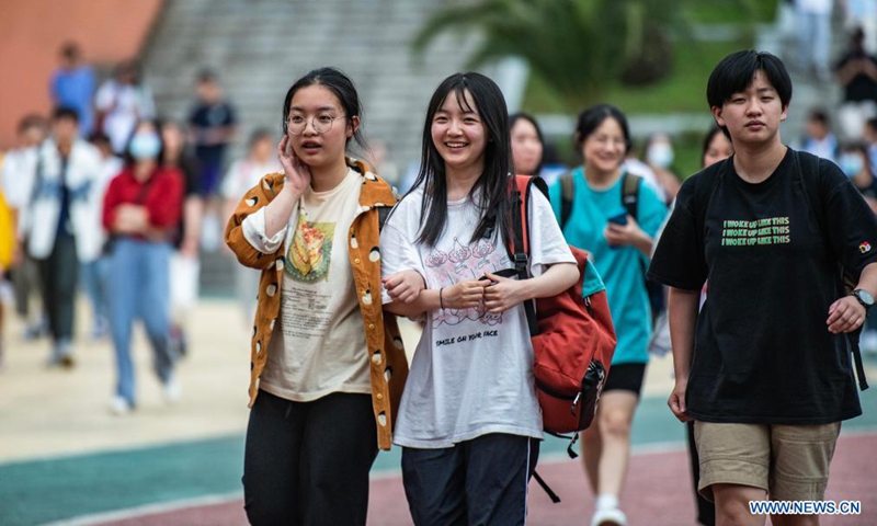 Examinees walk out of an exam site at a high school in Guiyang, the capital city of southwest China's Guizhou Province, June 8, 2021. Photo: Xinhua