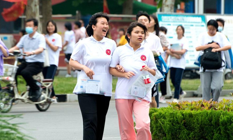 Examinees walk out of an exam site at a middle school in Jize County of Handan, north China's Hebei Province, June 9, 2021. China's annual college entrance exam concluded on Tuesday in some parts of the country. Photo: Xinhua