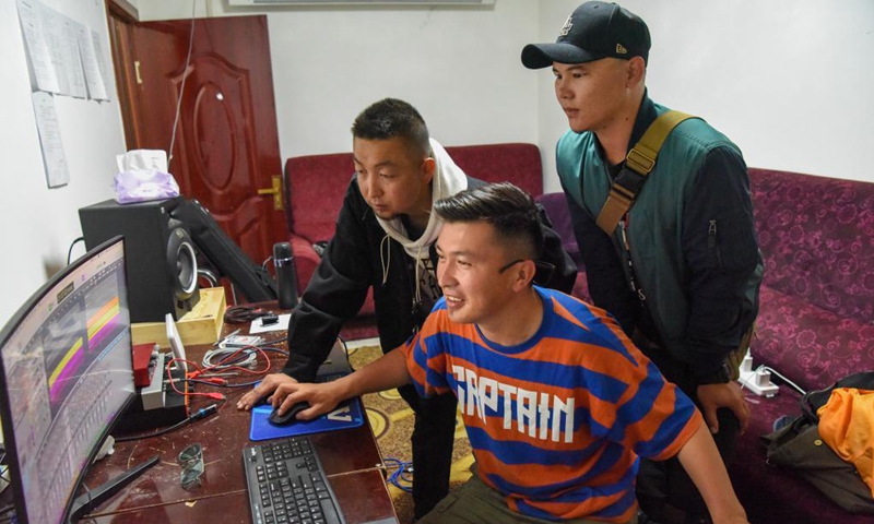 Members of Narat band record songs at a studio in Narat Town, Xinyuan County of northwest China's Xinjiang Uygur Autonomous Region, June 4, 2021. Photo: Xinhua