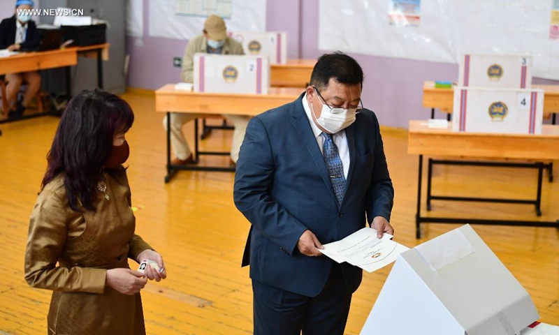 Presidential candidate Sodnomzundui Erdene, former chairman of the opposition Democratic Party, casts his vote at a polling station in Ulan Bator, Mongolia, June 9, 2021. Presidential election kicked off across Mongolia on Wednesday amid the COVID-19 pandemic, with over 2.1 million people eligible to vote.Photo: Xinhua