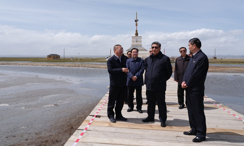 Chinese President Xi Jinping is briefed about the environmental protection efforts in the Qilian Mountains and Qinghai Lake, and inspects achievements made in comprehensively addressing environmental problems and protecting biodiversity at the lake, in Gangcha County of Haibei Tibetan Autonomous Prefecture, northwest China's Qinghai Province, June 8, 2021. Photo/Xinhua