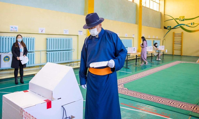 Presidential candidate Ukhnaa Khurelsukh, chairman of the ruling Mongolian People's Party, casts his ballot at a voting station in Ulan Bator, Mongolia, June 9, 2021.Photo: Xinhua