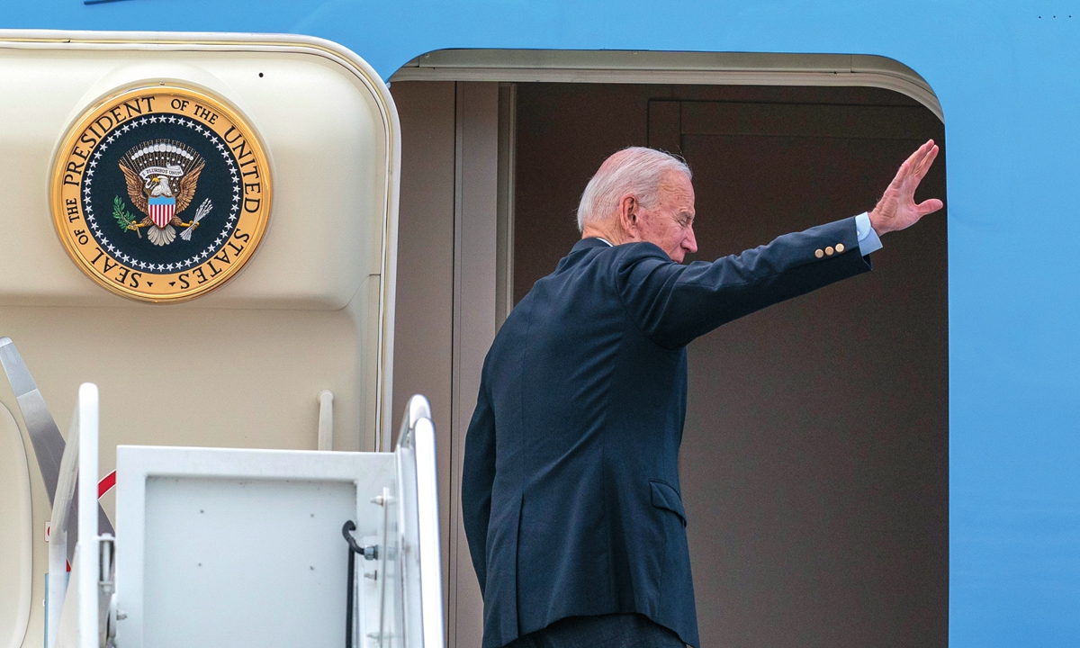 US President Joe Biden waves as he boards Air Force One on Wednesday at Andrews Air Force Base. Biden is embarking on the first overseas trip of his term, and is eager to reassert the US on the world stage, steadying European allies deeply shaken by his predecessor Donald Trump. Photo: AP