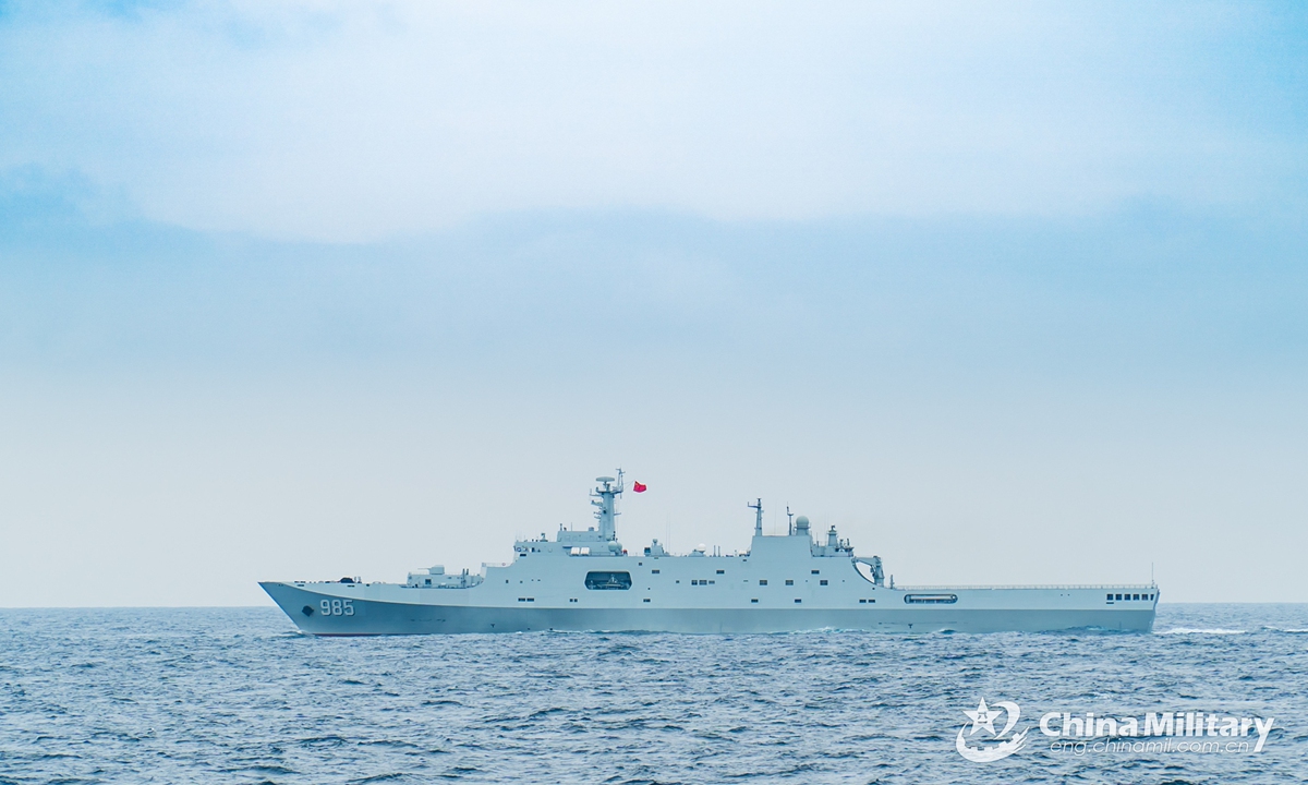 The amphibious dock landing ship Qilianshan (Hull 985) attached to a destroyer flotilla with the navy under the PLA Southern Theater Command steams in waters of the South China Sea during a four-day-long realistic-combat training exercise. Photo:China Military