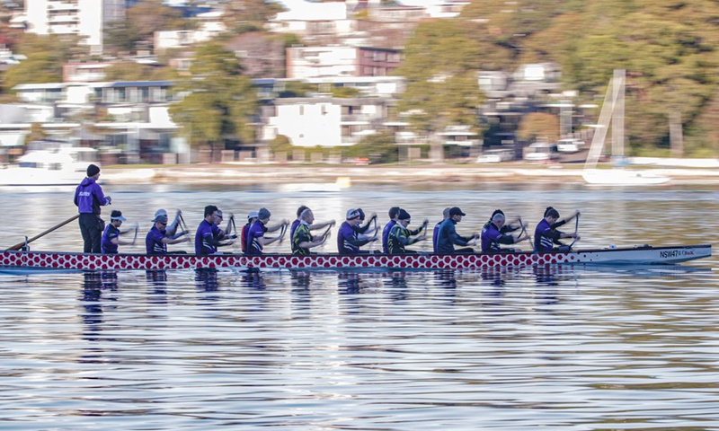 Members of Sloths Dragon Boat Club take part in a training session in Sydney, Australia, June 13, 2021.(Photo: Xinhua)