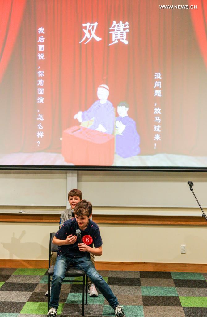 Contestants perform the Chinese style double act, also known as a comedy duo or Shuanghuang in Chinese, during the 2021 Chinese Bridge Chinese Proficiency Competition in Christchurch, New Zealand, June 13, 2021. Photo: VCG