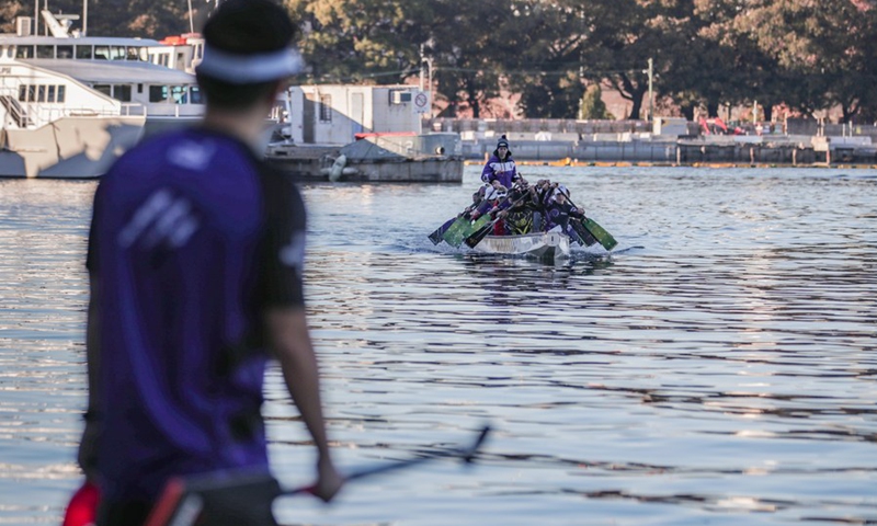 Members of Sloths Dragon Boat Club take part in a training session in Sydney, Australia, June 13, 2021.(Photo: Xinhua)