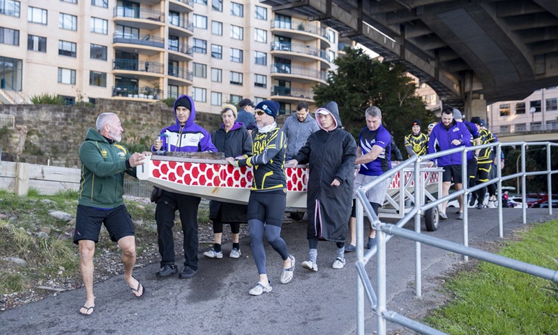 Members of Sloths Dragon Boat Club take part in a training session in Sydney, Australia, June 13, 2021.(Photo: Xinhua)