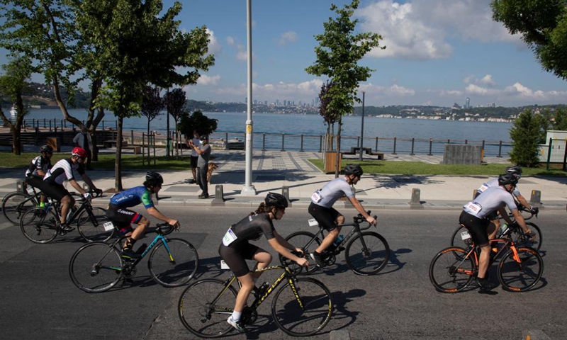 Cyclists take part in a cycling event in Istanbul, Turkey, on June 13, 2021. Turkey hosted Sunday a cycling event in the biggest city Istanbul to raise funds for the children of the healthcare workers who died fighting the COVID-19 pandemic.(Photo: Xinhua)