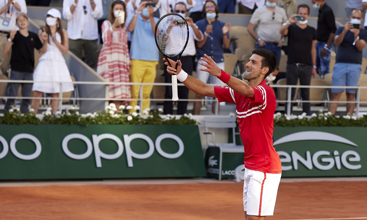 Novak Djokovic celebrates after winning his men's singles final match against Stefanos Tsitsipas at the 2021 French Open on Sunday in Paris. Photo: VCG