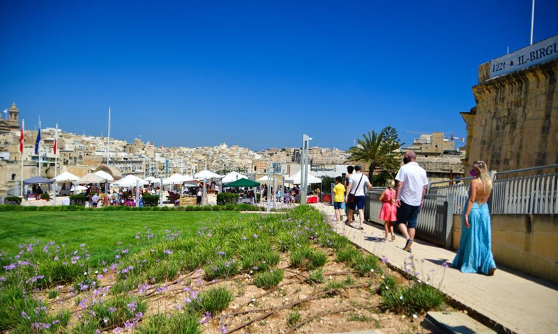 People visit the artisan market in Vittoriosa, Malta, on June 13, 2021. The market offers a wide array of products from local makers, designers, artisans and artists.(Photo: Xinhua)