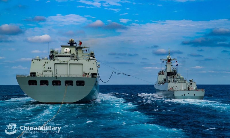 Warships attached to a destroyer flotilla with the navy under the PLA Southern Theater Command perform replenishment-at-sea during a four-day-long realistic-combat training exercise in waters of the South China Sea recently. (Photo: eng.chinamil.com.cn)