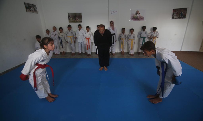 Palestinian children take part in a karate class at Rafah Youth Club in the southern Gaza Strip city of Rafah, on June 13, 2021. Palestinian Minister of Health Mai al-Kaila announced on Saturday that Palestine has recently witnessed a collective recovery from COVID-19. Photo: Xinhua