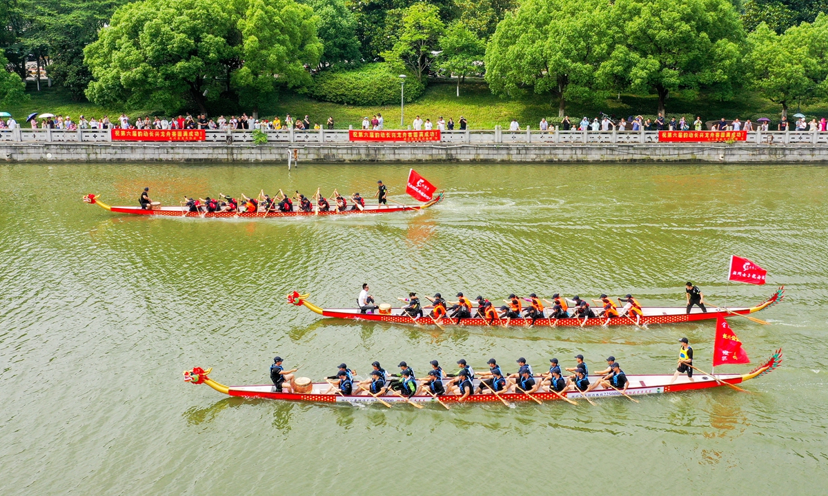 A dragon boat competation is held in East China's Zhejiang Province on Saturday. Photo: AFP
