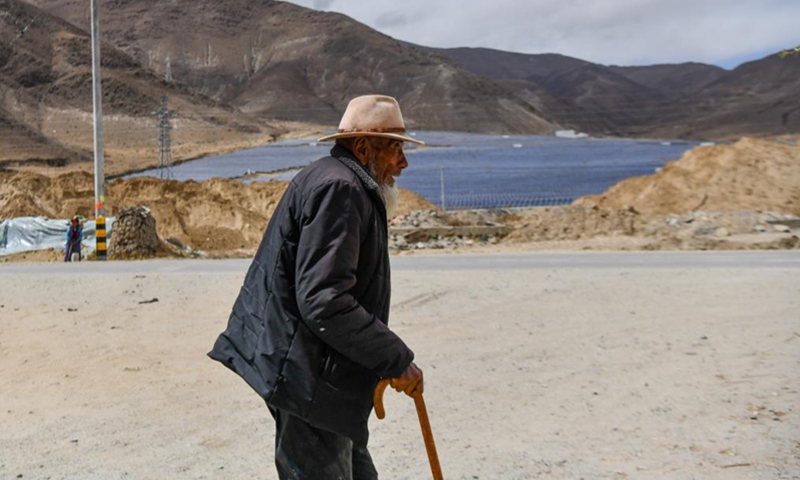 Tobgye walks to a teahouse to chat with his friends in Bomdoi Township, Dagze District of Lhasa, southwest China's Tibet Autonomous Region, April 25, 2021.In addition to exorbitant taxes, Tobgye and his family had to do various work like harvesting, weaving, cutting wood and grazing for their lords, sometimes they had to kneel on the ground so their lords can step on their backs to mount the horses. Photo: Xinhua 