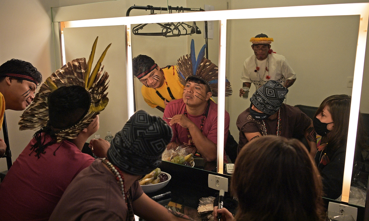Members of indigenous rap group Bro MC's practice in their dressing room before a show in Rio de Janeiro, Brazil on May 13. Photo: AFP