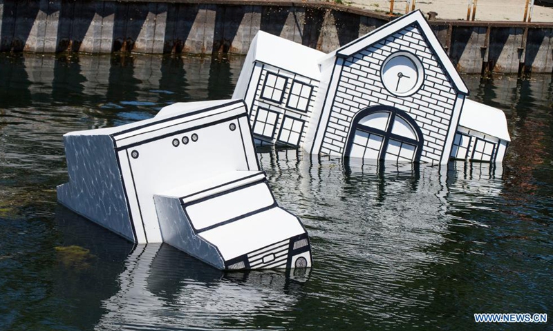 The art installation Over Floe is seen at Ontario Place in Toronto, Canada, on June 15, 2021. Made of some waste construction materials by artist John Notten, the public art project Over Floe aims to illustrate the harm of human-caused global warming as ice sheets melt and oceans expand, threatening the way of life around the shorelines of the world.(Photo: Xinhua)