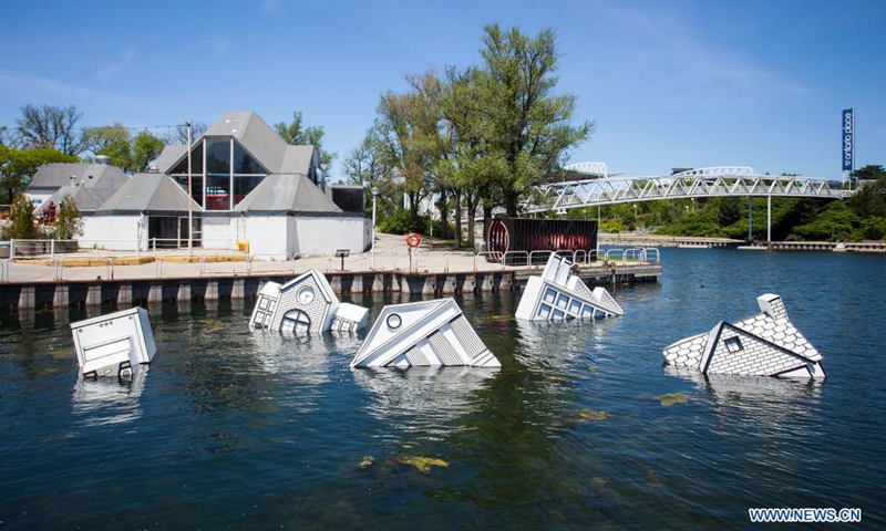 The art installation Over Floe is seen at Ontario Place in Toronto, Canada, on June 15, 2021. Made of some waste construction materials by artist John Notten, the public art project Over Floe aims to illustrate the harm of human-caused global warming as ice sheets melt and oceans expand, threatening the way of life around the shorelines of the world.(Photo: Xinhua)