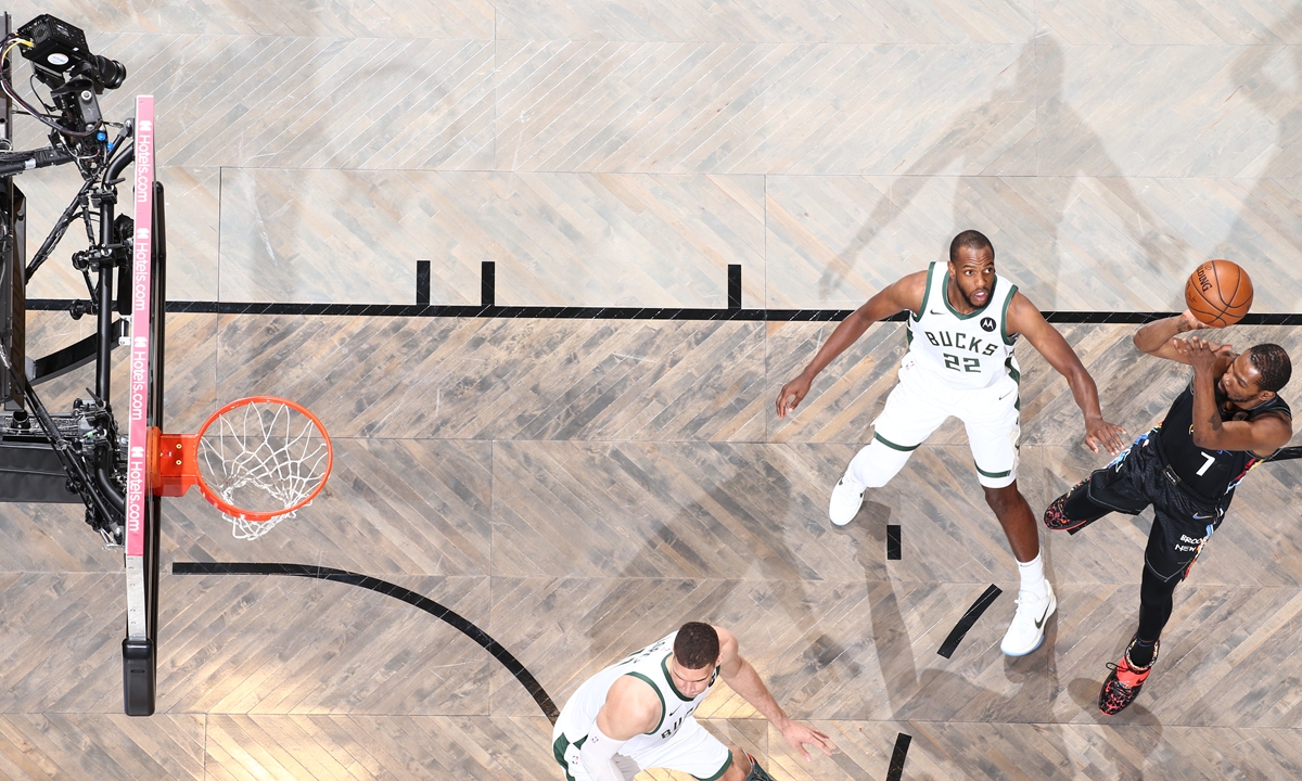 Kevin Durant of the Brooklyn Nets shoots against the Milwaukee Bucks on Tuesday in New York City. Photo: VCG