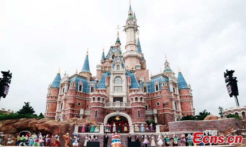 Shanghai Disney Resort celebrates its fifth birthday in front of the Enchanted Storybook Castle on June 16, 2021. (Photo/ Tang Yanjun) 
