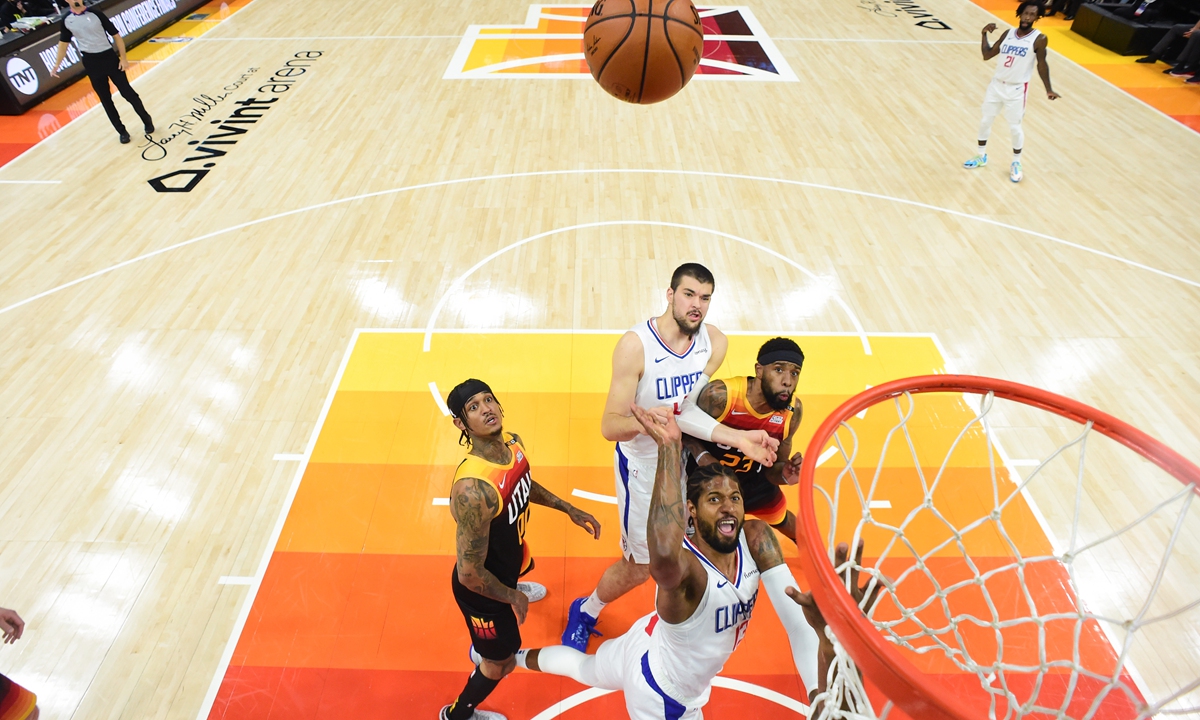 Paul George of the Los Angeles Clippers shoots the ball against the Utah Jazz on Wednesday in Salt Lake City, Utah. Photo: VCG