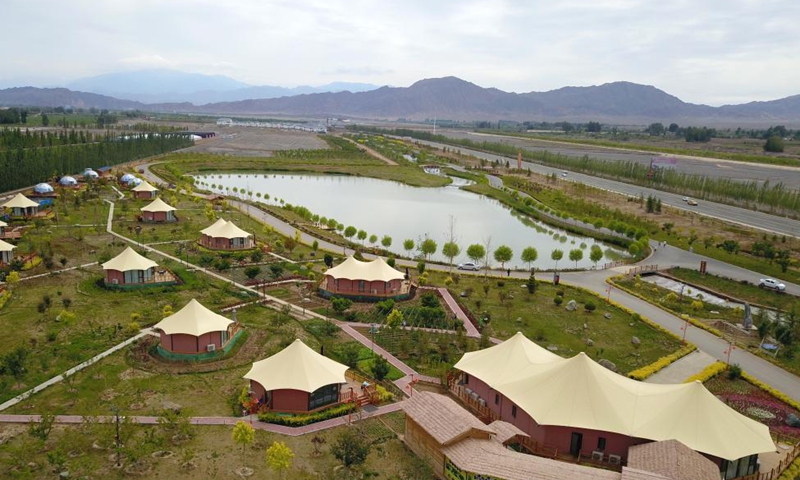 Aerial photo taken on June 16, 2021 shows a view of a river system in Linze County, Zhangye City, northwest China's Gansu Province. Linze County is located in the southern edge of Badain Jaran Desert, the third largest desert in China, with Heihe River, China's second largest inland river, passing through the county.  Photo: Xinhua