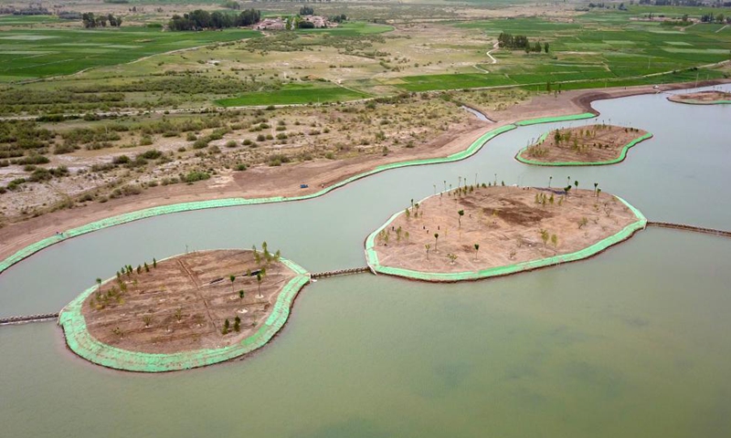 Aerial photo taken on June 10, 2021 shows a water system under construction in Linze County, Zhangye City, northwest China's Gansu Province. Photo: Xinhua