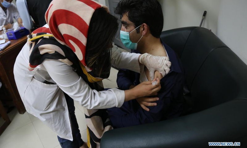 A medical worker administers a dose of China's Sinopharm COVID-19 vaccine in Kabul, capital of Afghanistan, June 17, 2021.Photo:Xinhua