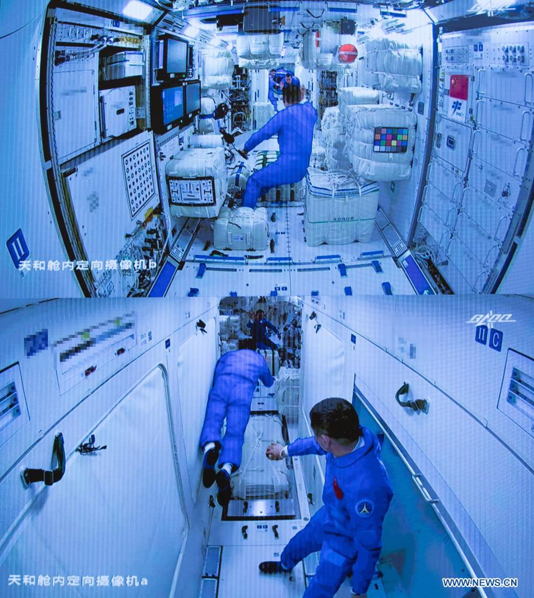 A imagem da tela capturada no Centro de Controle Aeroespacial de Pequim em Pequim, capital da China, em 17 de junho de 2021 mostra três astronautas chineses a bordo da espaçonave Shenzhou-12 entrando no módulo central da estação espacial Tianhe.  Foto: Xinhua