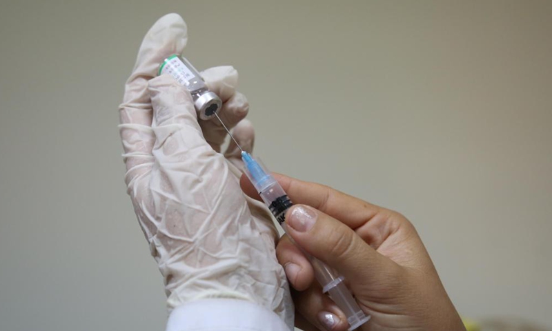 A medical worker prepares a dose of China's Sinopharm COVID-19 vaccine in Kabul, capital of Afghanistan, June 17, 2021. Photo:Xinhua