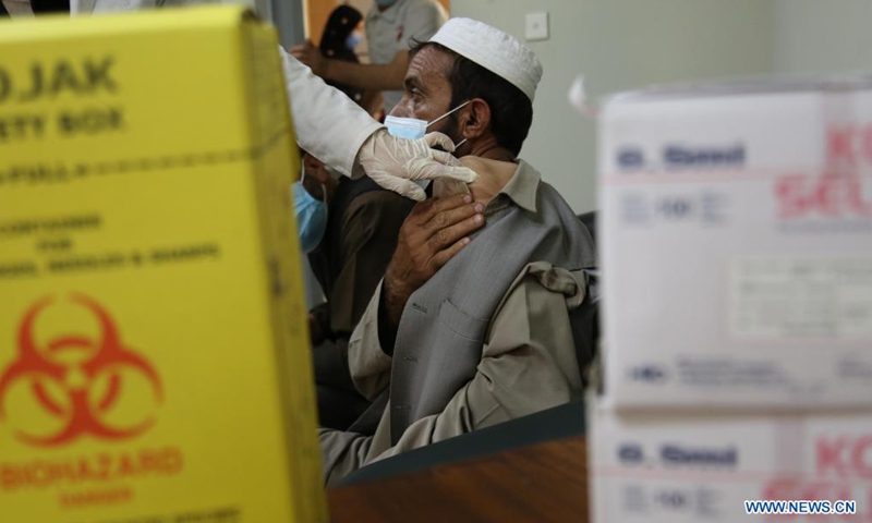 A medical worker administers a dose of China's Sinopharm COVID-19 vaccine in Kabul, capital of Afghanistan, June 17, 2021. Photo:Xinhua