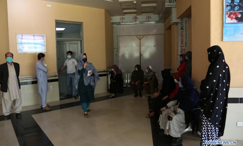 Local people wait to receive China's Sinopharm COVID-19 vaccine in Kabul, capital of Afghanistan, June 17, 2021. Photo:Xinhua