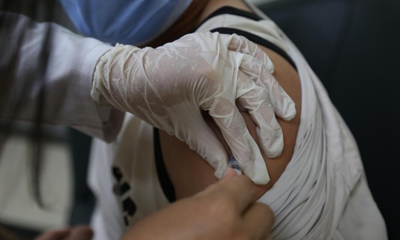 A medical worker administers a dose of China's Sinopharm COVID-19 vaccine in Kabul, capital of Afghanistan, June 17, 2021. Photo:Xinhua