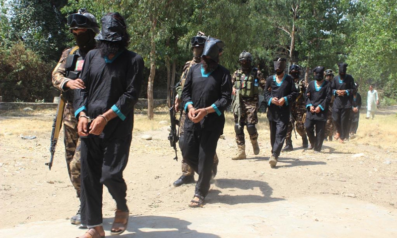 Suspected Taliban insurgents are seen under custody in Asadabad, capital of Kunar Province, Afghanistan, June 20, 2021. Ten suspected Taliban insurgents have been arrested in Afghanistan's eastern Kunar Province, the provincial governor said Sunday.(Photo: Xinhua)