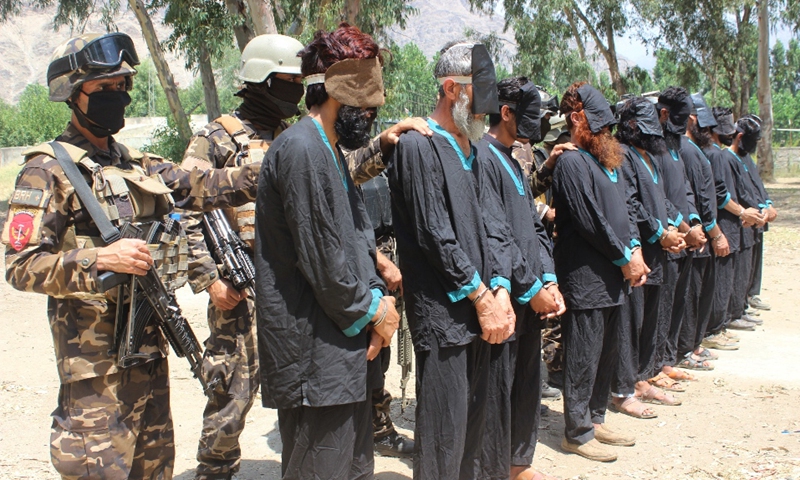 Suspected Taliban insurgents are seen under custody in Asadabad, capital of Kunar Province, Afghanistan, June 20, 2021. Ten suspected Taliban insurgents have been arrested in Afghanistan's eastern Kunar Province, the provincial governor said Sunday.(Photo: Xinhua)