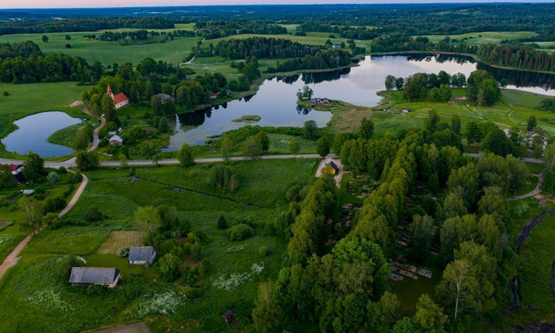 Photo taken on June 17, 2021 shows the summer scenery of countryside in Cesis, Latvia.(Photo: Xinhua)