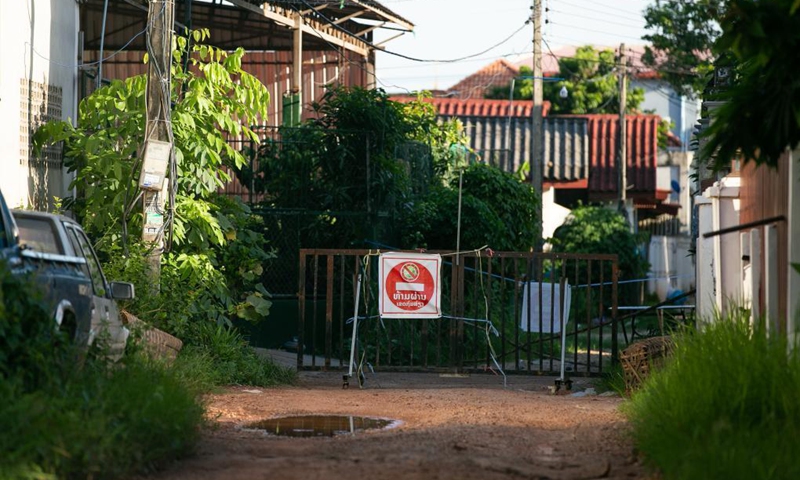 Photo taken on June 19, 2021 shows a blocked area with COVID-19 cases in Vientiane, Laos. Laos has extended its lockdown COVID-19 prevention measures across the country for a further 15 days as the community spread of COVID-19 in the capital continues.(Photo: Xinhua)