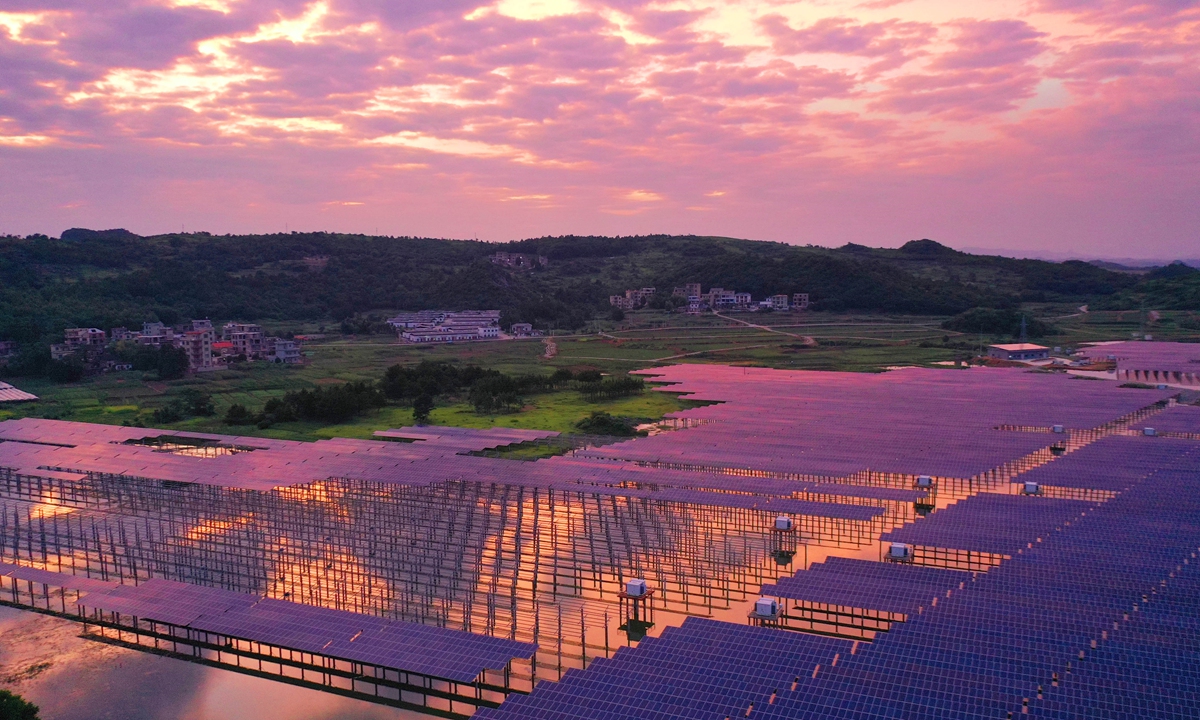 A photovoltaic power station operates under the rays of the evening sun at Wuliping village in Yongzhou city, Central China's Hunan Province on Saturday. The village has built a 20-megawatt 