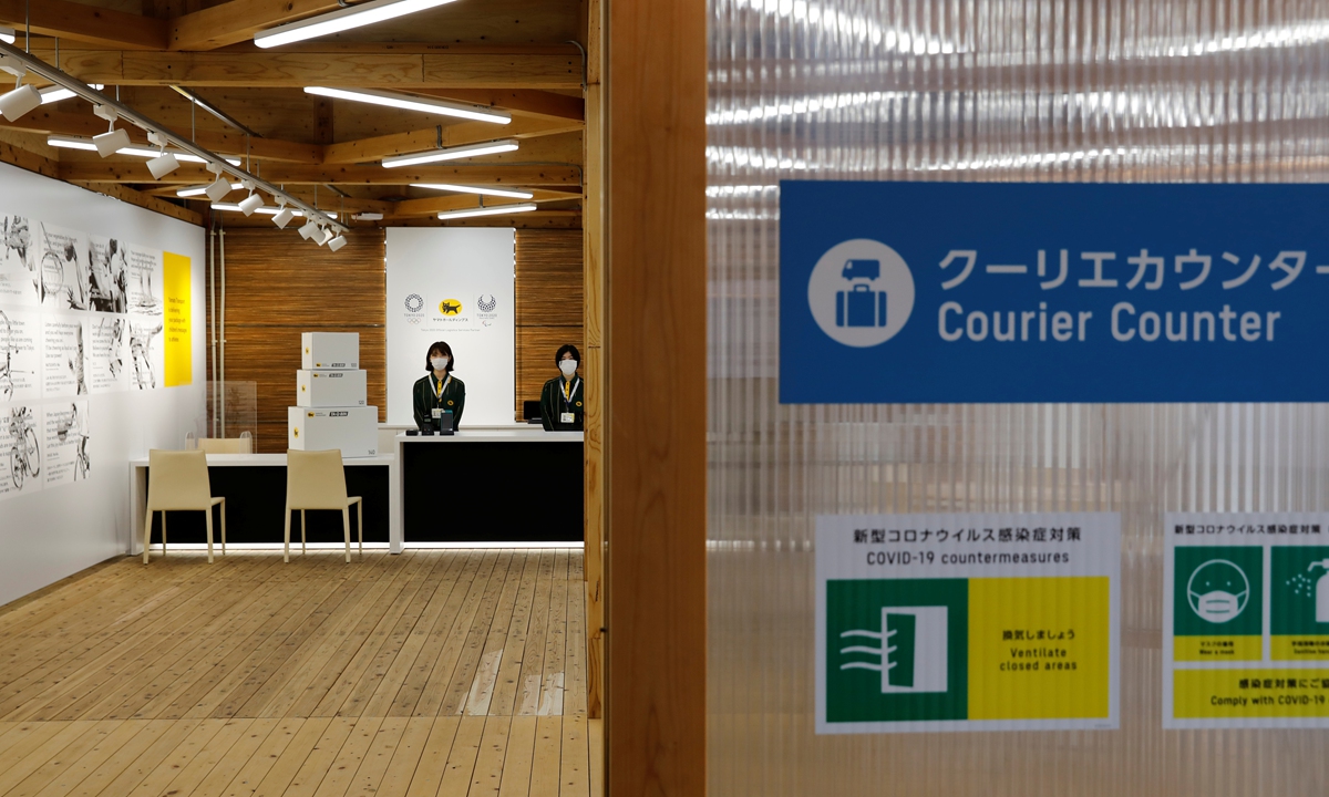 A courier counter at the village plaza of the Tokyo 2020 Olympic Village is pictured in Tokyo, Japan on Sunday. Photo: IC