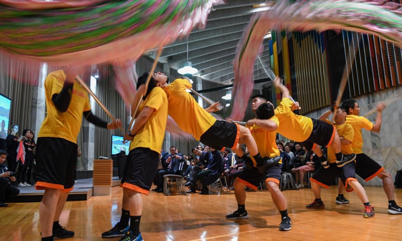 Performers from Dragon Dance Troupe of Wellington Chinese Sports and Cultural Centre stage a dragon dance during the Parliamentary Chinese Dragon Boat Festival Celebration at Wellington, New Zealand, June 21, 2021. The parliamentary celebration on China's traditional Dragon Boat Festival held in New Zealand has been expected to boost the understandings and cultural exchanges between the two countries.(Photo: Xinhua)