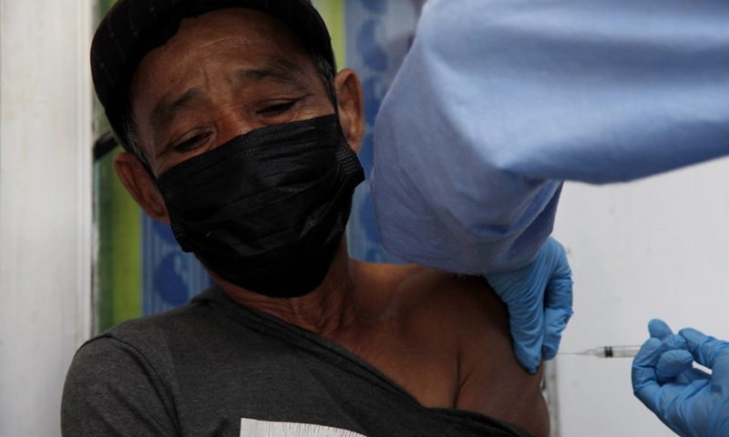 A man receives a dose of the COVID-19 vaccine at Cianjur district, West Java, Indonesia. June 22, 2021.(Photo: Xinhua)
