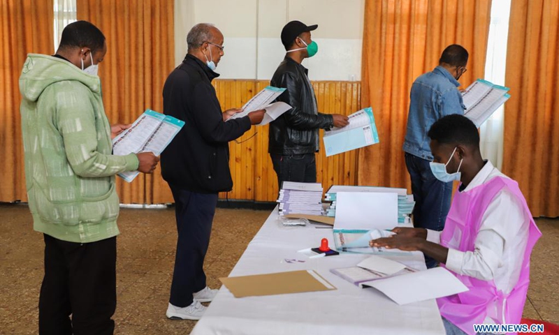 Voters are seen at a polling station in Addis Ababa, Ethiopia, on June 21, 2021. Voters went to the polls in Ethiopia on Monday for the twice delayed sixth general elections. Millions of Ethiopians are voting their representatives, both for the House of Peoples' Representatives (HoPR) - the lower house of the Ethiopian parliament, as well as for the regional state councils as more than 9,000 candidates run at the federal and regional levels.(Photo: Xinhua)
