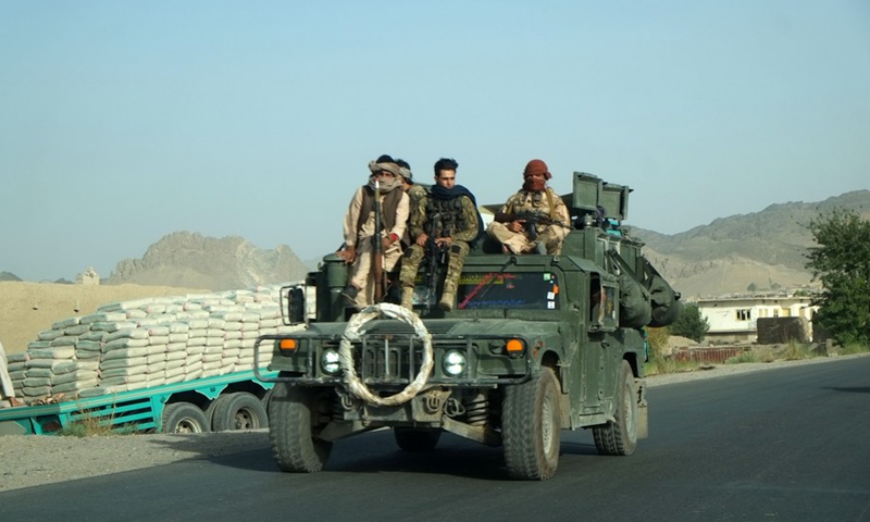 Afghan security force members are seen on a military vehicle during a military operation in Zhari district of southern Kandahar province, Afghanistan, June 22, 2021.(Photo: Xinhua)
