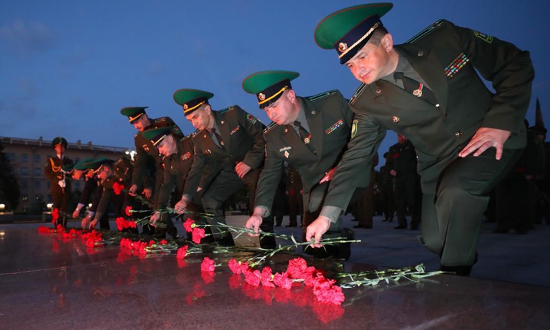Soldiers attend a memorial ceremony marking the 80th anniversary of the start of the Great Patriotic War (1941-1945) in Minsk, Belarus, June 22, 2021.(Photo: Xinhua)