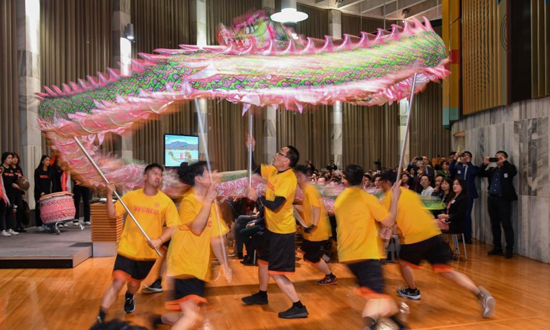 Performers from Dragon Dance Troupe of Wellington Chinese Sports and Cultural Centre stage a dragon dance during the Parliamentary Chinese Dragon Boat Festival Celebration at Wellington, New Zealand, June 21, 2021. The parliamentary celebration on China's traditional Dragon Boat Festival held in New Zealand has been expected to boost the understandings and cultural exchanges between the two countries.(Photo: Xinhua)